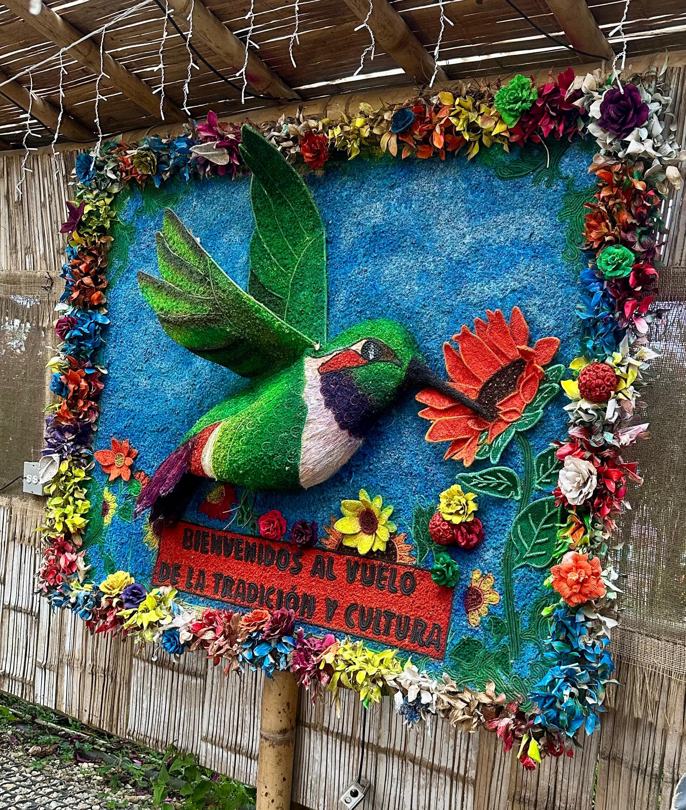 Familia y turistas disfrutando de un pasadía en los jardines de Santa Elena Antioquia